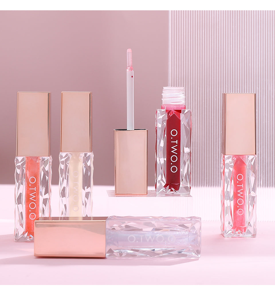 Mocno regenerujący błyszczyk do ust Clear Crystal Berry Lip